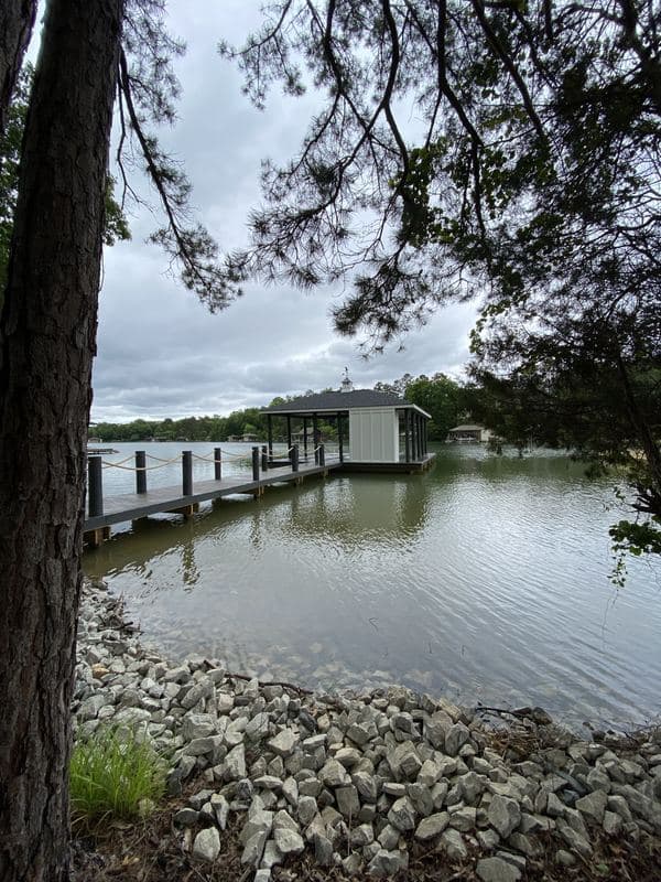 The finished dock seen from the wooded shoreline