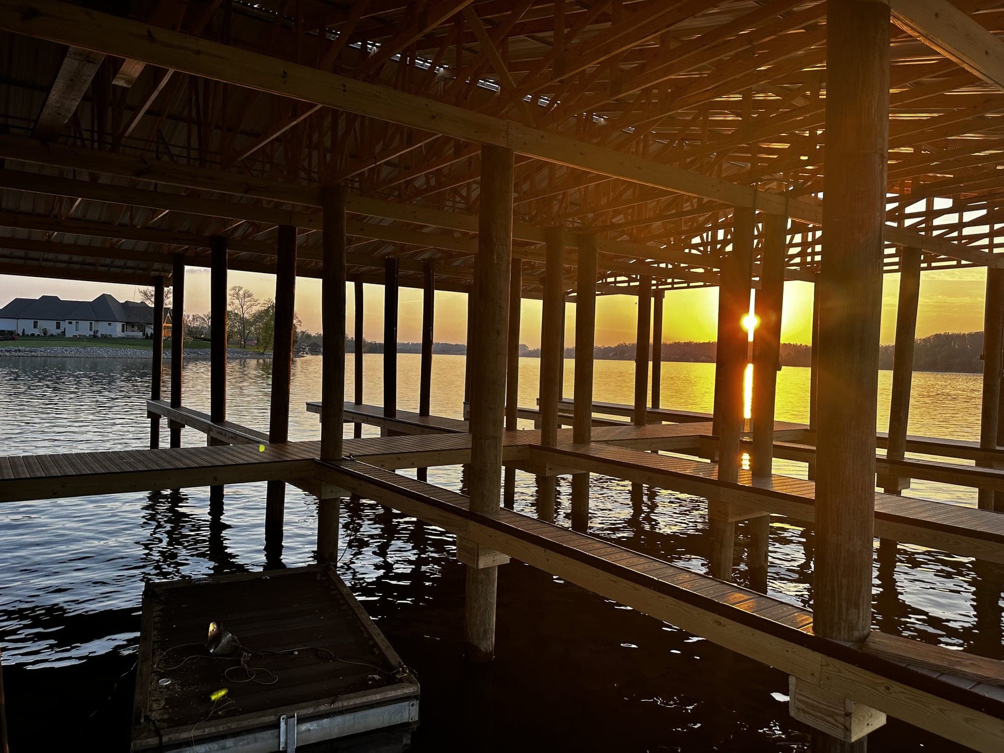 Covered slips at Lowe’s Ferry Marina on Fort Loudoun Lake in Louisville at sunset