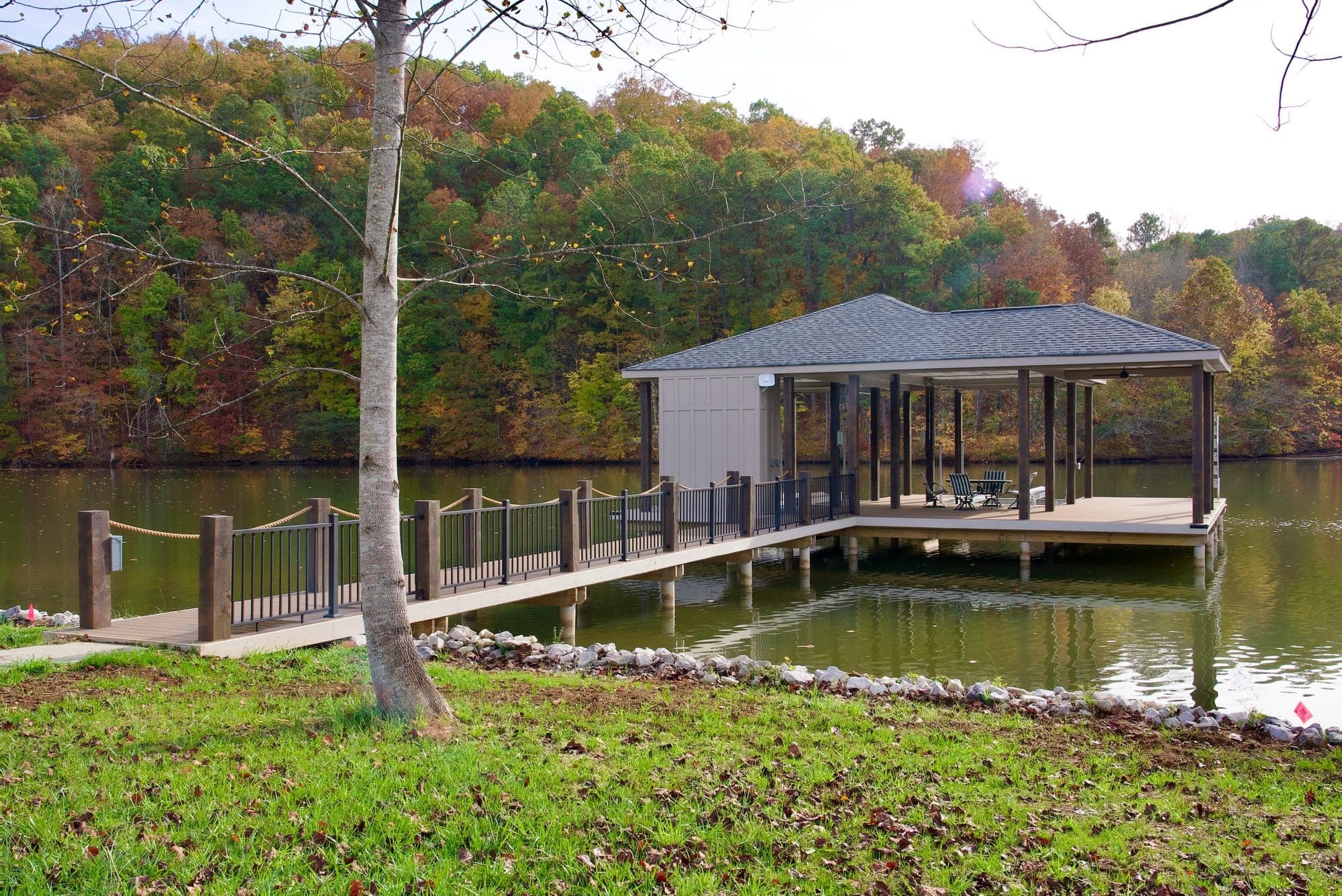 Covered DOCK&DECK dock with a walkway across a lawn on Tellico Lake in Vonore