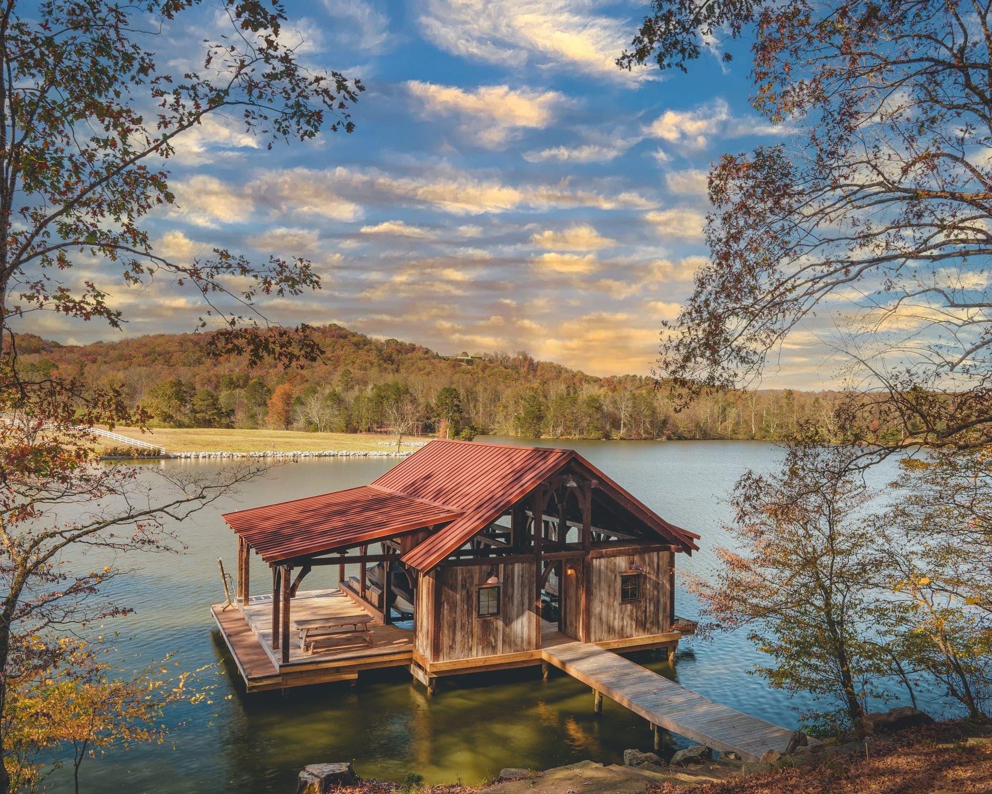 Timber-frame DOCK&DECK boat dock on Watts Bar Lake in Kingston at sunset